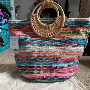 Woven beach tote with wooden handle